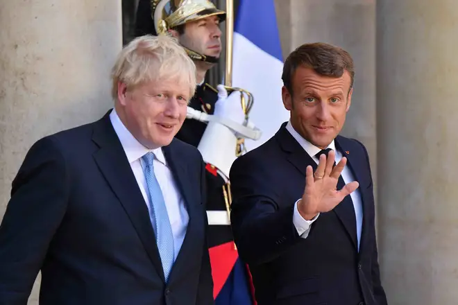 r Macron pictured with UK Prime Minister Boris Johnson
