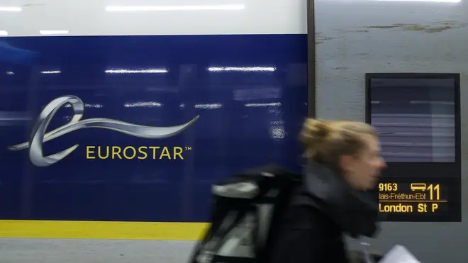 File photo: A passenger prepares to take the "Eurostar" train from Brussels to London