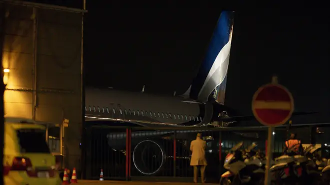 A plane is seen arriving in Melsbroek, Belgium, from Wuhan carrying European nationals