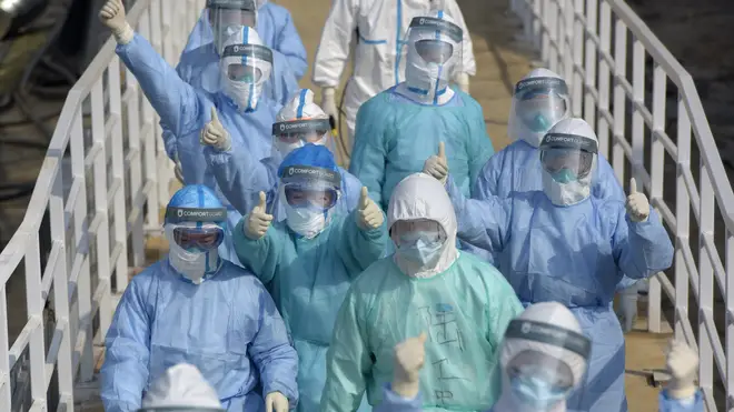 Chinese medical personnel have been seen wearing protective gear