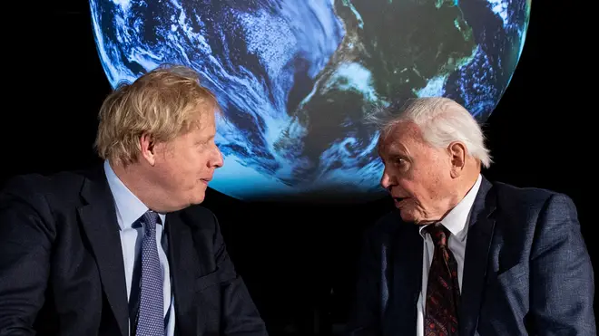 Boris Johnson, left, talks with David Attenborough during the COP 26 launch