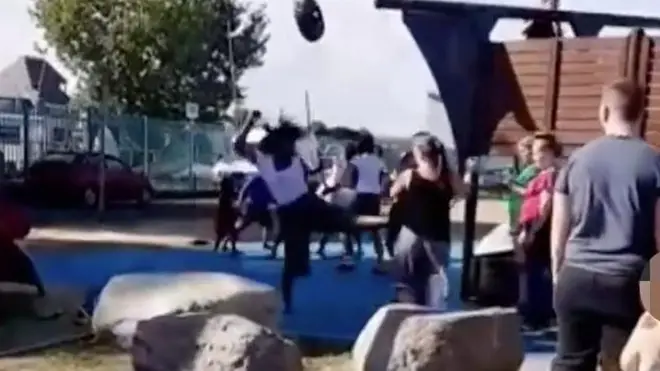 The brawl erupted at a playground in Kent on Monday afternoon