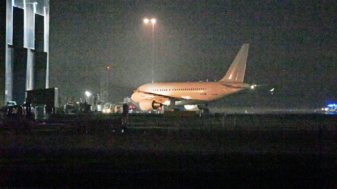 A plane brings British nationals back to the UK from the coronavirus-hit city of Wuhan on Sunday