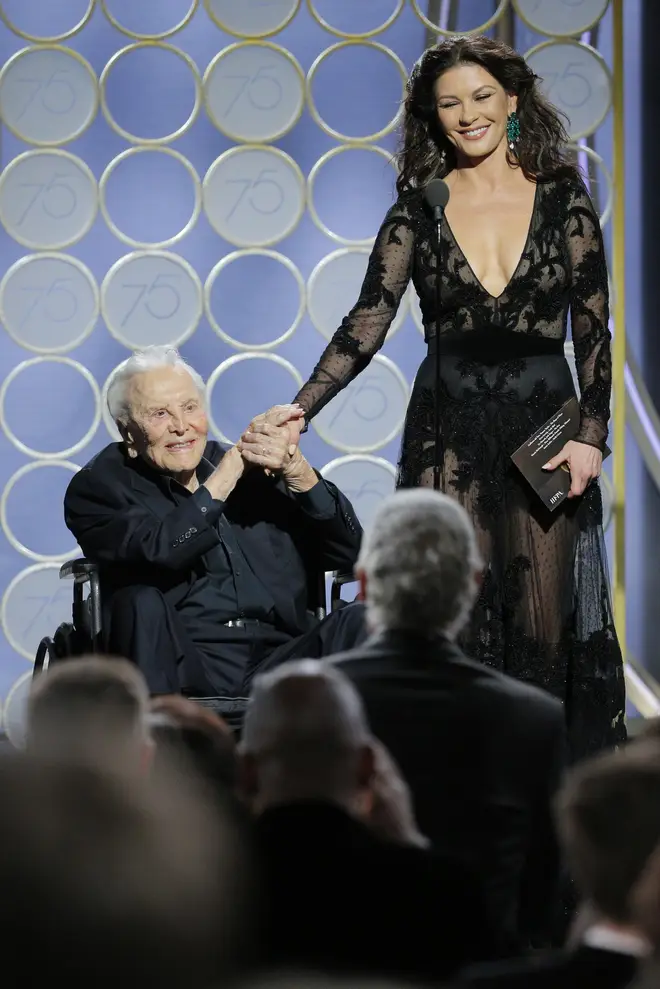 Kirk Douglas and Catherine Zeta-Jones present during the 75th Golden Globe Awards in 2018