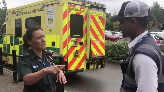 One of the paramedics attempted to reason with the warden