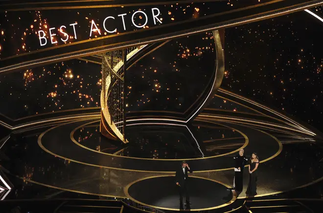 He takes to the stage after winning the Oscar