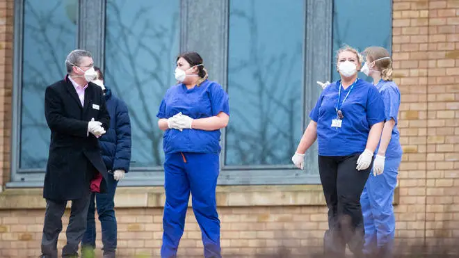 NHS staff prepare to greet travellers from Wuhan