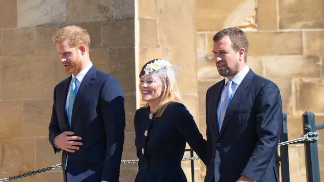The couple with Prince Harry (left) at church last year