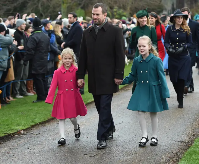 Peter pictured with the couple's daughters, Savannah and Isla