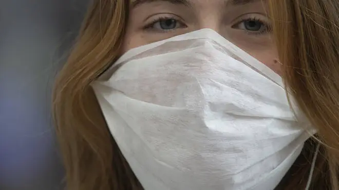 Can face masks really protect us from coronavirus? Experts reveal all