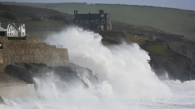 Storm waves crash into the sea wall at Porthleven in Cornwall during storm Ciara - worse weather is expected this weekend