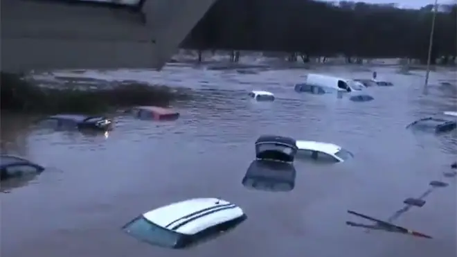Cars under water in the village of Taff Well north of Cardiff