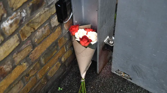 Floral tributes were laid outside Ms Flack's home
