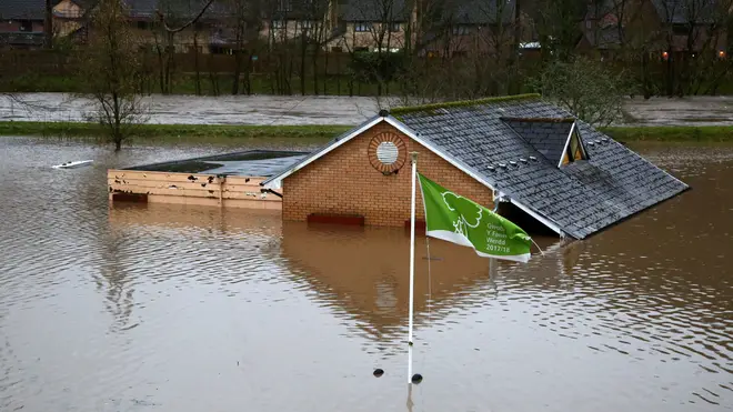 Flood water surrounds the bowling club after the River Taff burst its banks in Taffs Wells, north of Cardiff