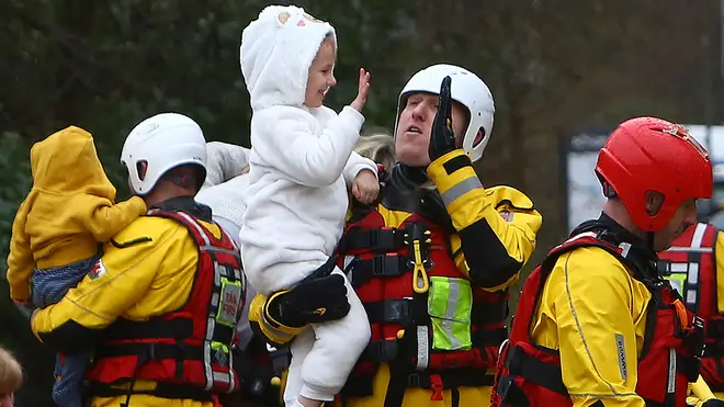 Rescuers kept spirits high as they ensured residents were safe