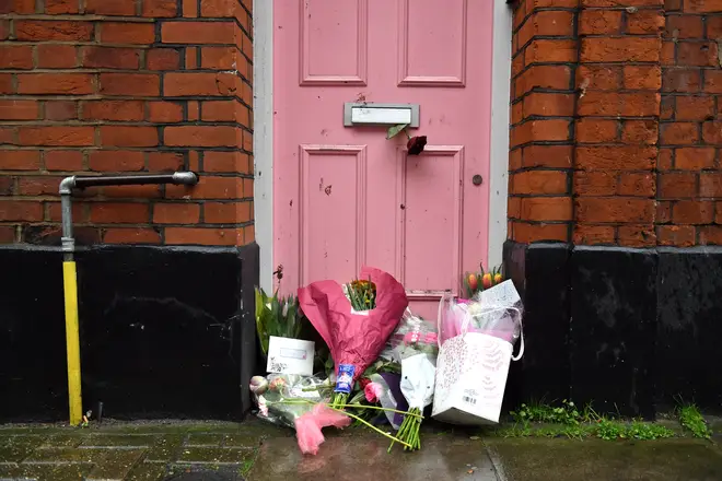 Floral tributes outside Caroline Flack's former North London home