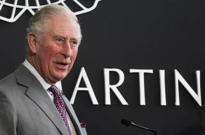 The prince of wales is visiting the Aston Martin plant as part of his tour of flood-hit areas