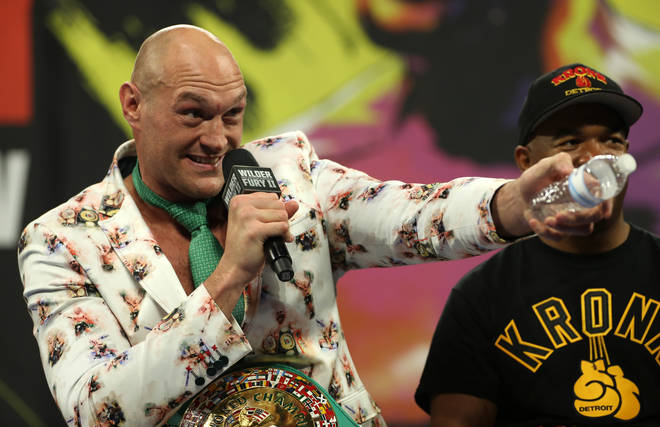 Tyson Fury knocked down reigning champion Wilder before finally claiming victory in the seventh round