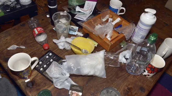 Drugs, cash and a fake gun was recovered from various properties in the raid