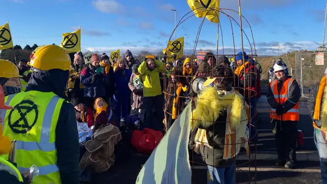 XR protesters block the mine's entrance