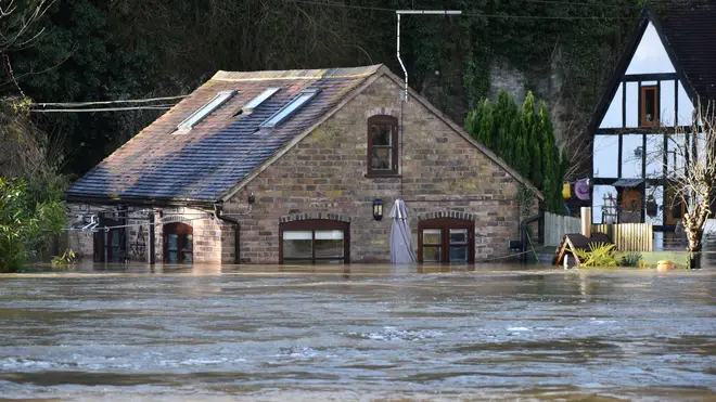 Flood defences in Ironbridge have been overwhelmed by the volume of water