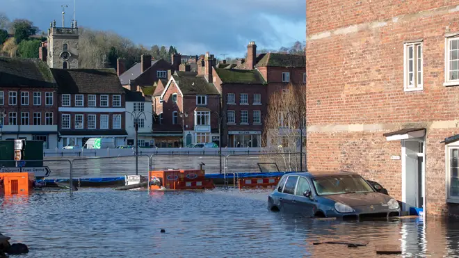 A Porsche sits in floodwater in Bewdley, Worcestershire