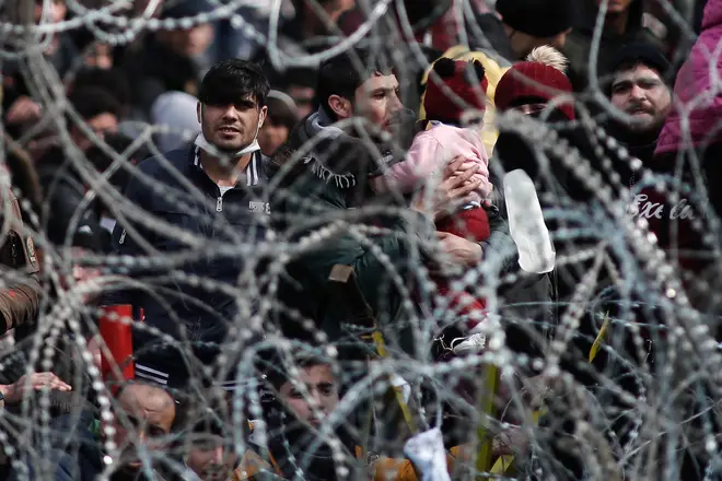 Thousands of people have gathered at Greece's land border with Turkey