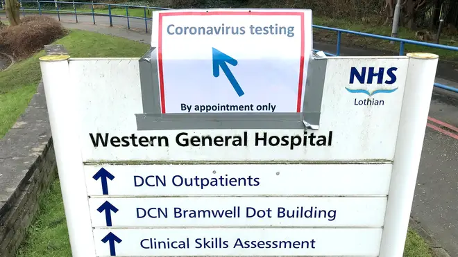 Signs for coronavirus testing at the Western General Hospital, Edinburgh