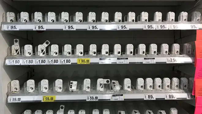 Empty shelves where hand sanitiser is usually stocked in an Asda store in Clapham Junction, London