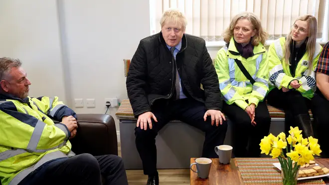 Britain's Prime Minister Boris Johnson meets with emergency services' members as he visits Bewdley