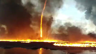 The stunning "firenado" was captured by firefighters
