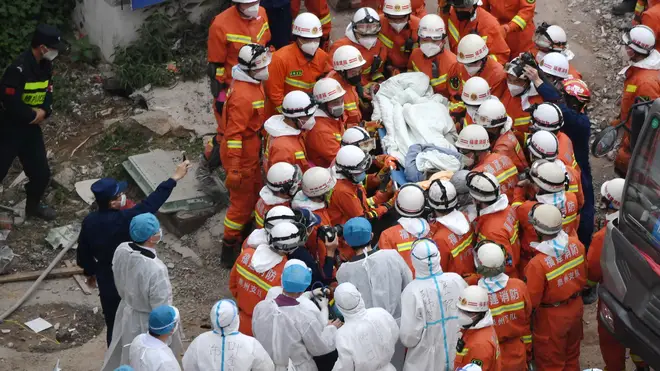 Rescue workers pull the man out after three days