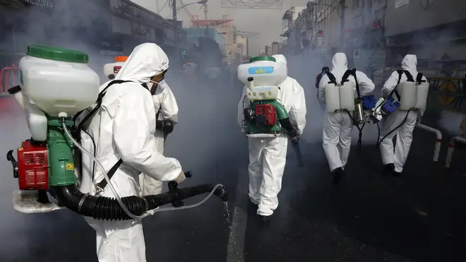 Firefighters have been spotted disinfecting streets in Tehran in recent weeks