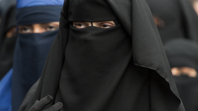 A woman wearing a burka
