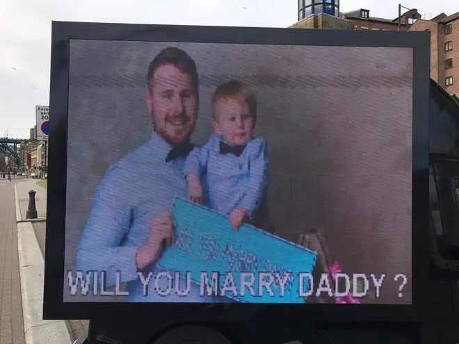 Jamie got a van with a picture of him and their son to propose