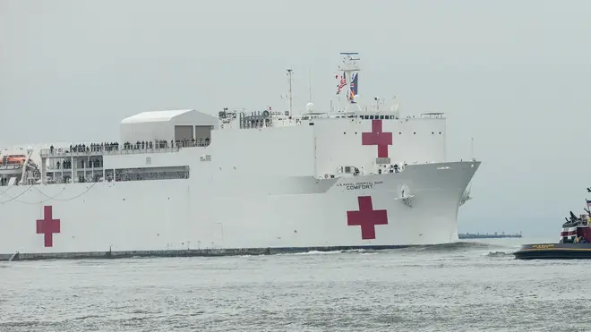 USNS Comfort Navy ship with 1000 beds to relief NYC hospitals on COVID-19 pandemic passes under Verrazzano-Narrows bridge
