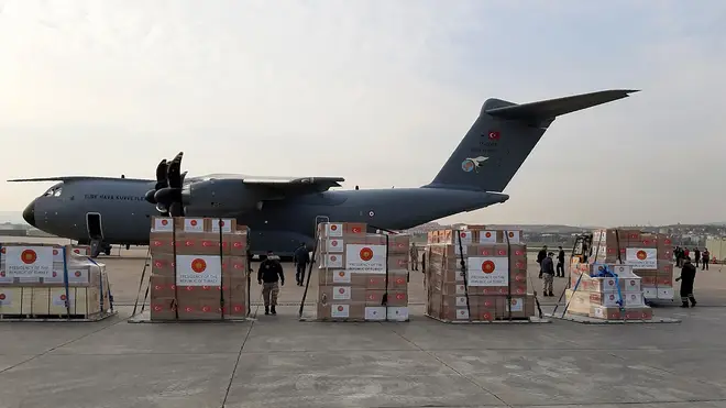 Soldiers in Turkey prepare to load a military cargo plane with Personal Protection Equipment heading to Italy and Spain