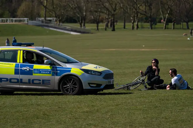 Police were clearing people from parks around the UK