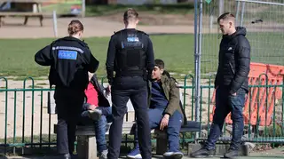 Police disperse a group of youngsters from a playground in Kent
