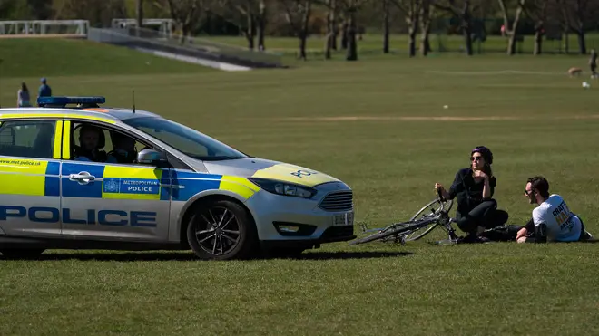 Police patrol Regent's Park in London during the lockdown