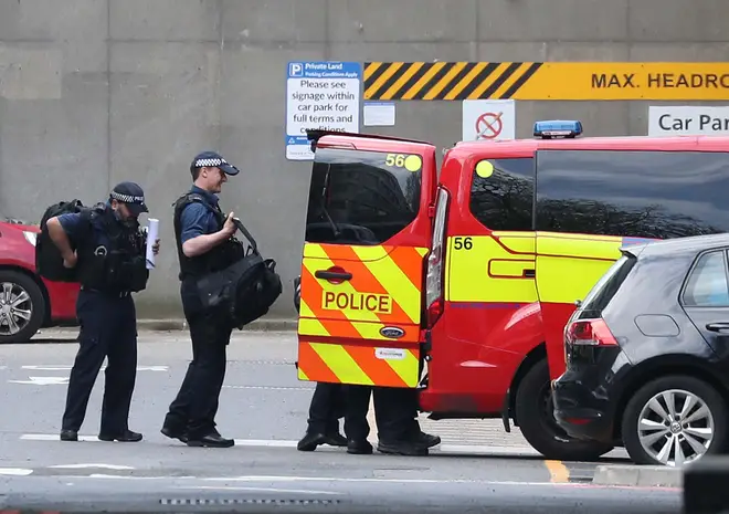 Police vans and other vehicles were seen leaving the hospital where Boris Johnson was being cared for