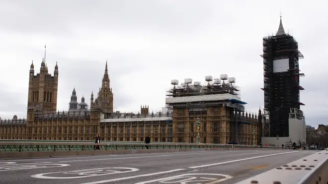 The Houses of Parliament overlook a deserted Westminster Bridge