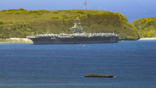 The ship is currently moored in Guam