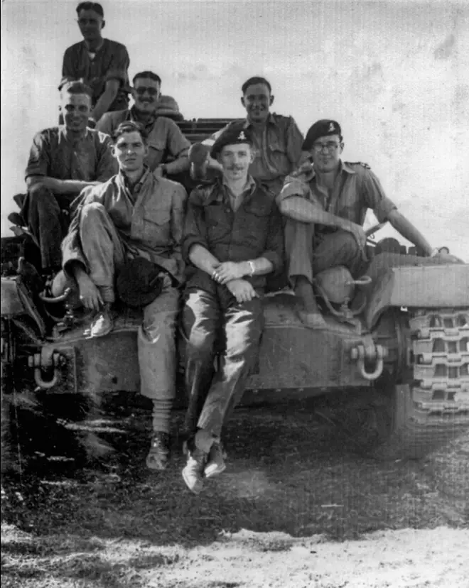 Mr Moore pictured centre during the war