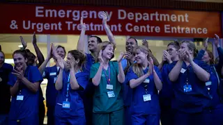 Nurses applaud each other outside Chelsea and Westminster Hospital