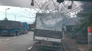 Damage to the cement lorry's windscreen
