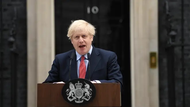 Boris Johnson speaking outside Downing Street on his return to work
