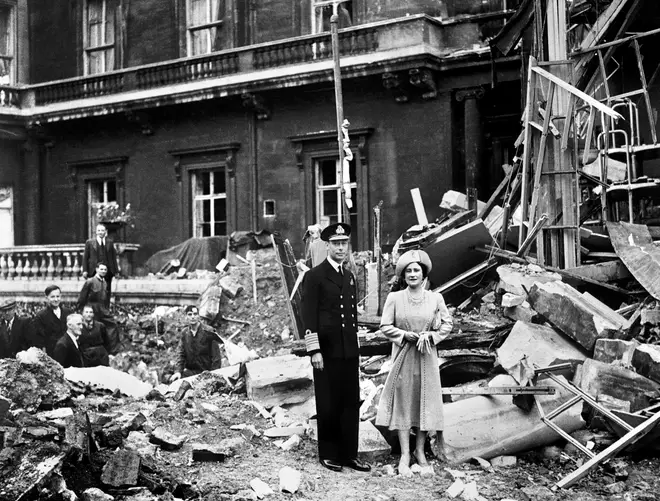 King George VI and the Queen Mother standing amid the bomb damage at Buckingham Palace on 10/09/40