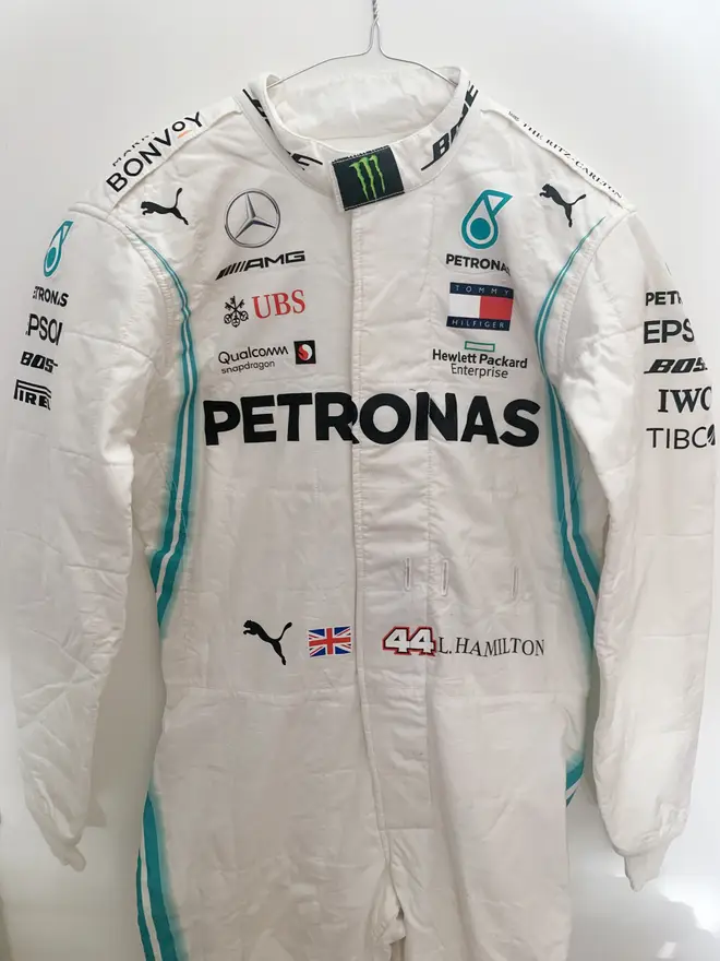 Lewis Hamilton's race suit raised £12,000