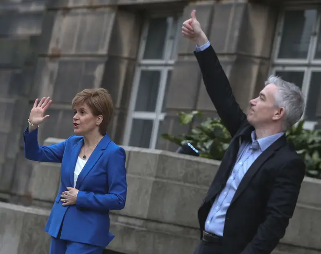 Dr Gregor Smith, pictured with Ms Sturgeon, said he would also urge caution on the claim